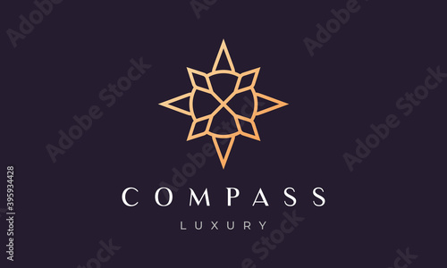 simple compass logo concept with modern and luxury style with gold color