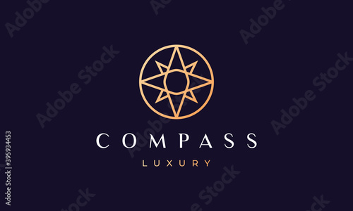 simple compass logo concept in a modern and luxury style with gold color