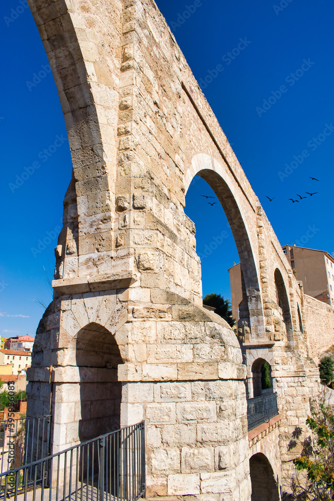 Detail architecture of the medieval aqueduct of Los Arcos in Teruel