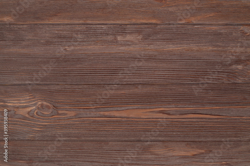 Photo of brown aged wooden background, texture, table top view