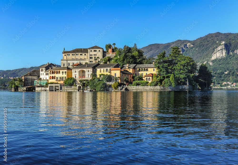 The island of San Giulio on Lake Lago d, Orta is famous for the Basilica of St. Julius with frescoes from the 14th to 16th centuries and the only street of Silence that encircles the entire island.   