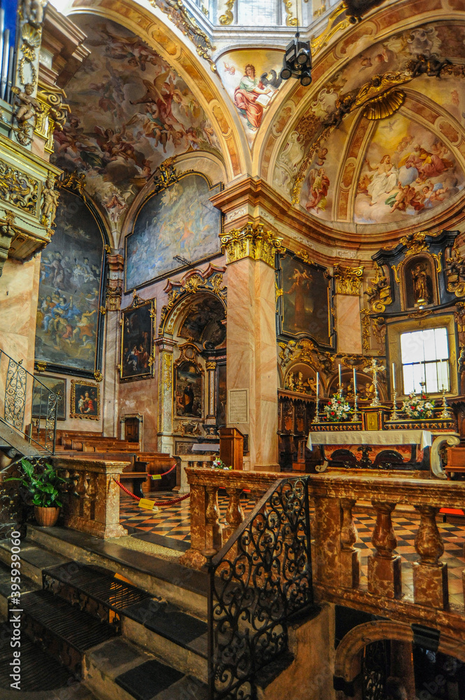 Fototapeta premium The island of San Giulio on Lake Lago d, Orta is famous for the Basilica of St. Julius with frescoes from the 14th to 16th centuries and the only street of Silence that encircles the entire island.