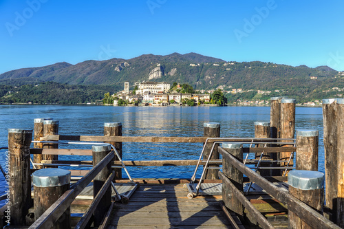 The island of San Giulio on Lake Lago d, Orta is famous for the Basilica of St. Julius with frescoes from the 14th to 16th centuries and the only street of Silence that encircles the entire island. 