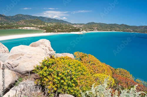 crystal clear water and white sand at Porto Giunco beach in Villasimius