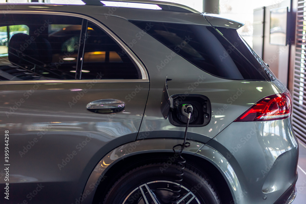 charging the car with electricity at the station