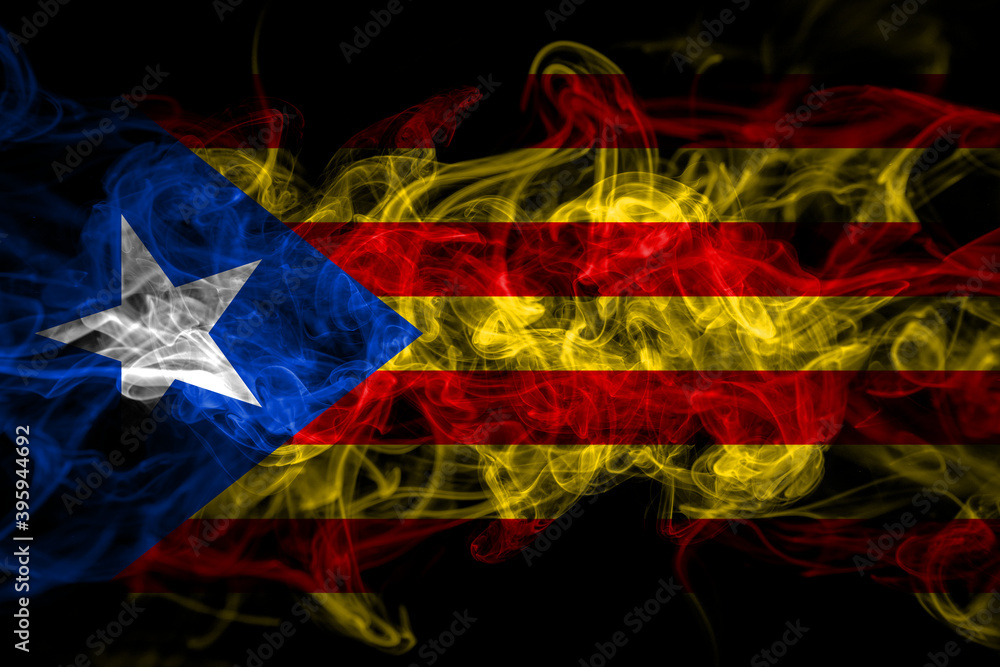 Catalonia, Catalan, Catalonian, Spain smoke flag isolated on black background Catalonia, Catalan, Catalonian, Spain smoke flag isolated on black background