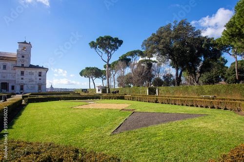 Fragment of Villa Medici anв garden next to Villa with Amazing italian Pinias