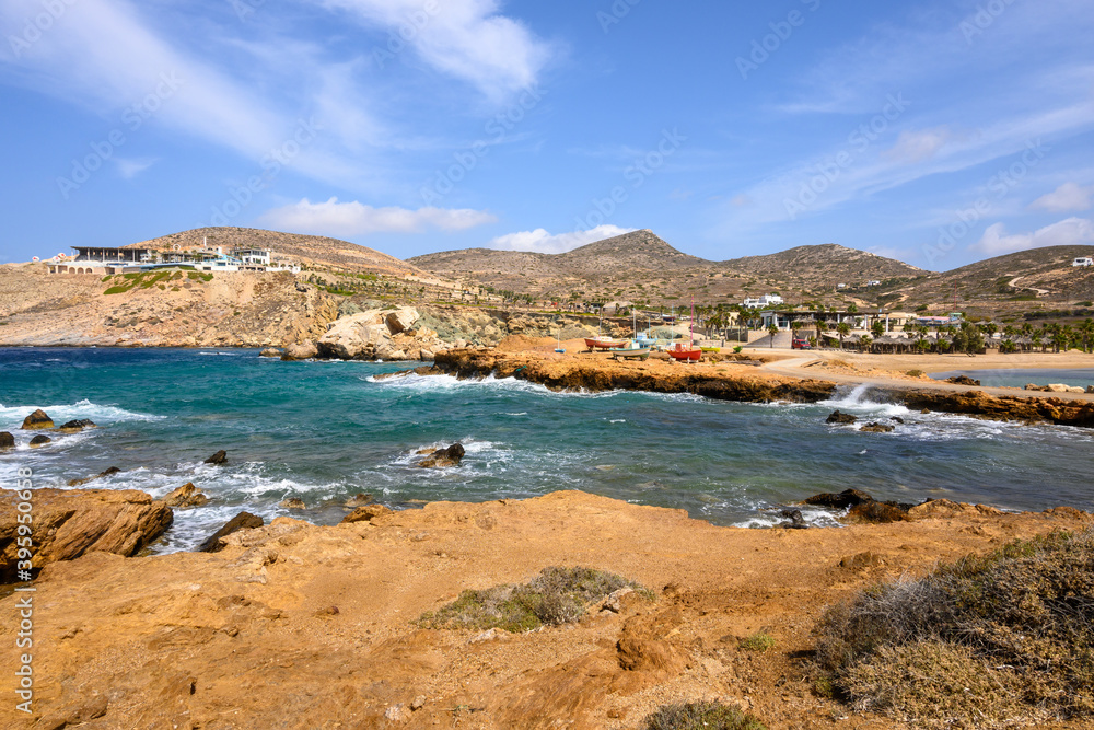 Koumbara beach located in a rocky bay on Ios Island. Cyclades, Greece Koumbara beach located in a rocky bay on Ios Island. Cyclades, Greece