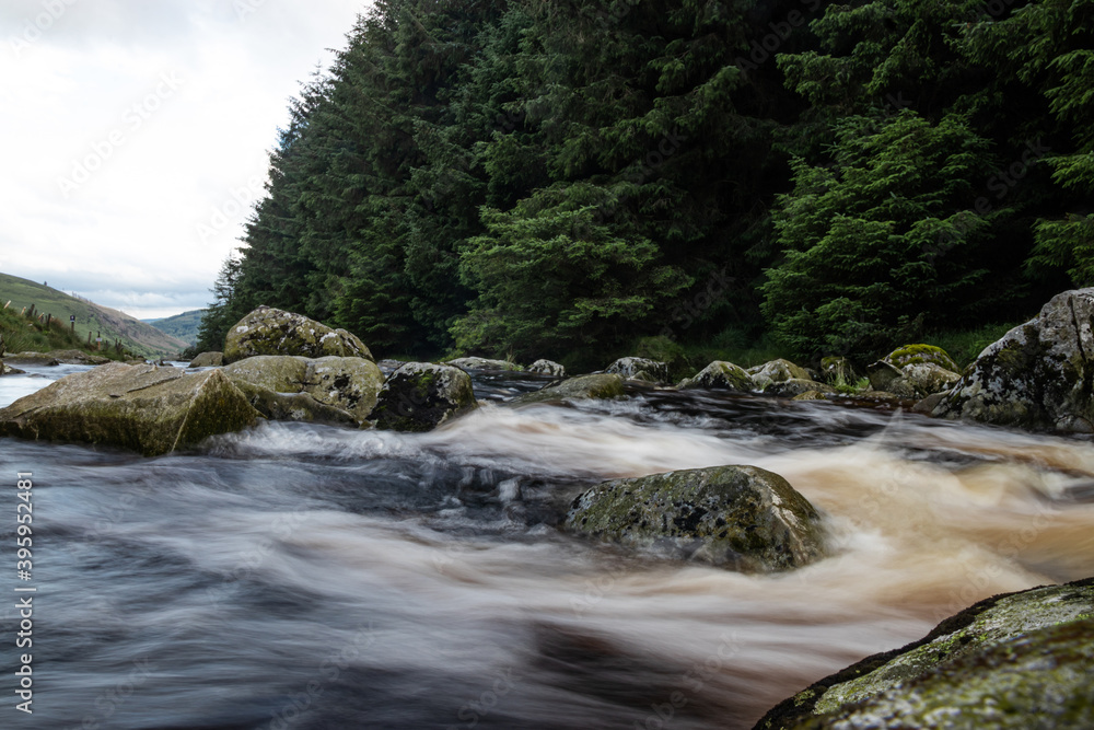 Beautiful view of The Glenmacnass river in the Wicklow mountains Beautiful view of The Glenmacnass river in the Wicklow mountains