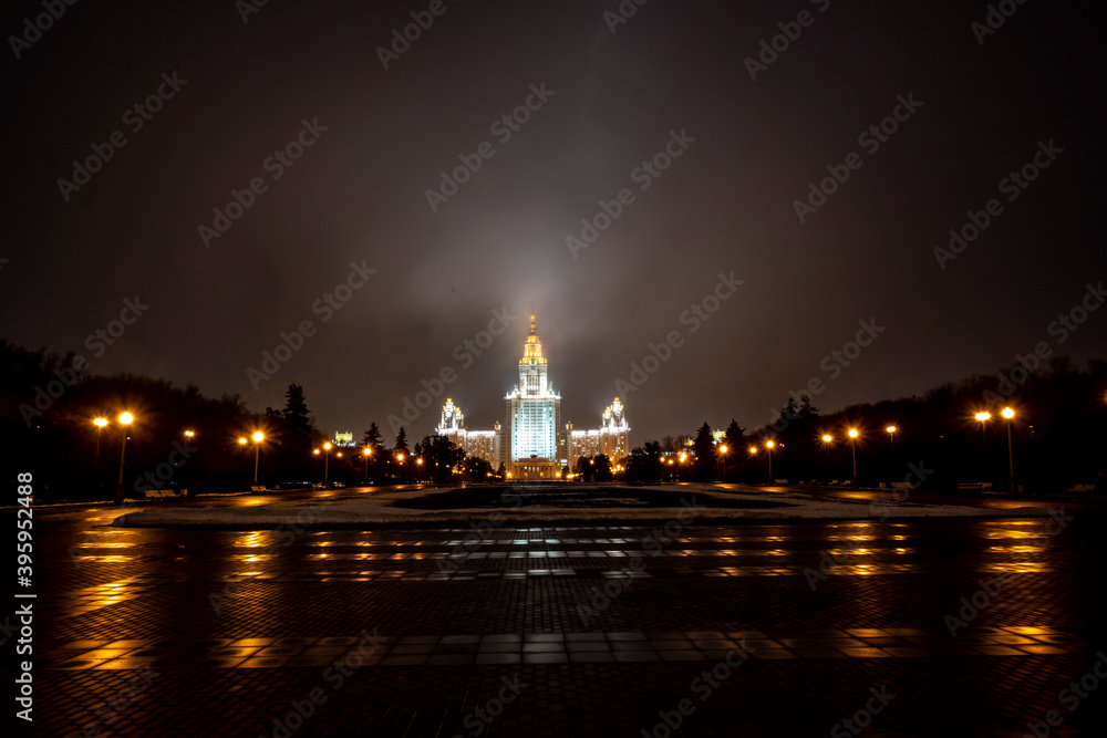 night view of the city in late autumn when the first snow falls