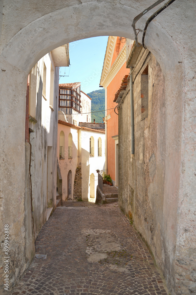 A narrow street with among the old houses of Rivello, a medieval village in the Basilicata region.