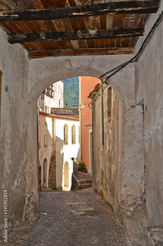 A narrow street with among the old houses of Rivello, a medieval village in the Basilicata region. © Giambattista