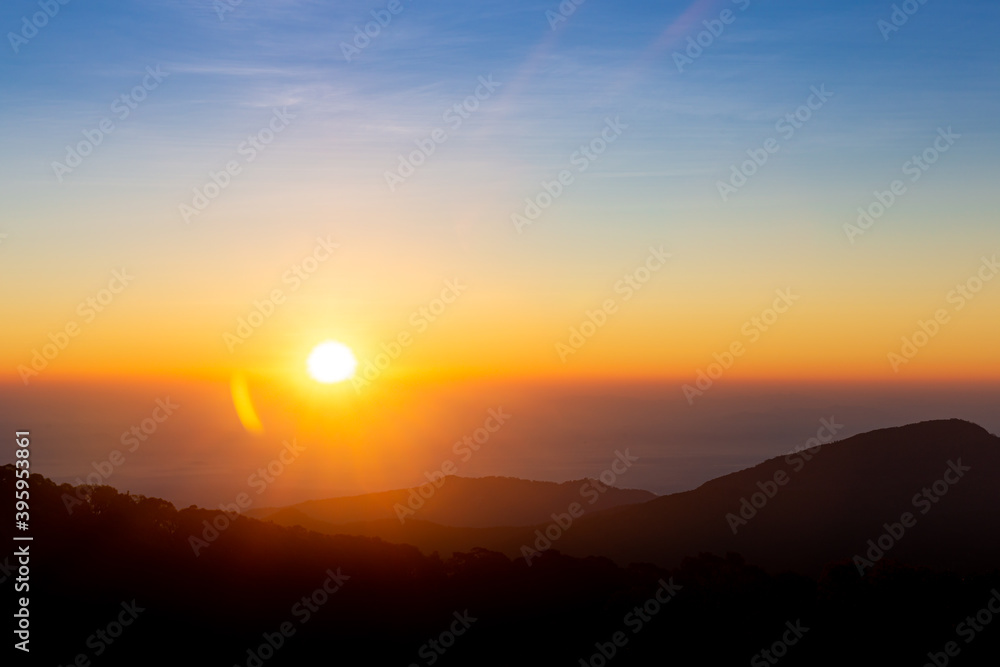 Beautiful sunrise with bright colors and mountains. Beautiful sunrise with bright colors and mountains.