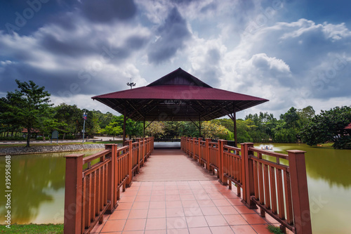 A long exposure picture of Traditional house at the lake in Joho photo