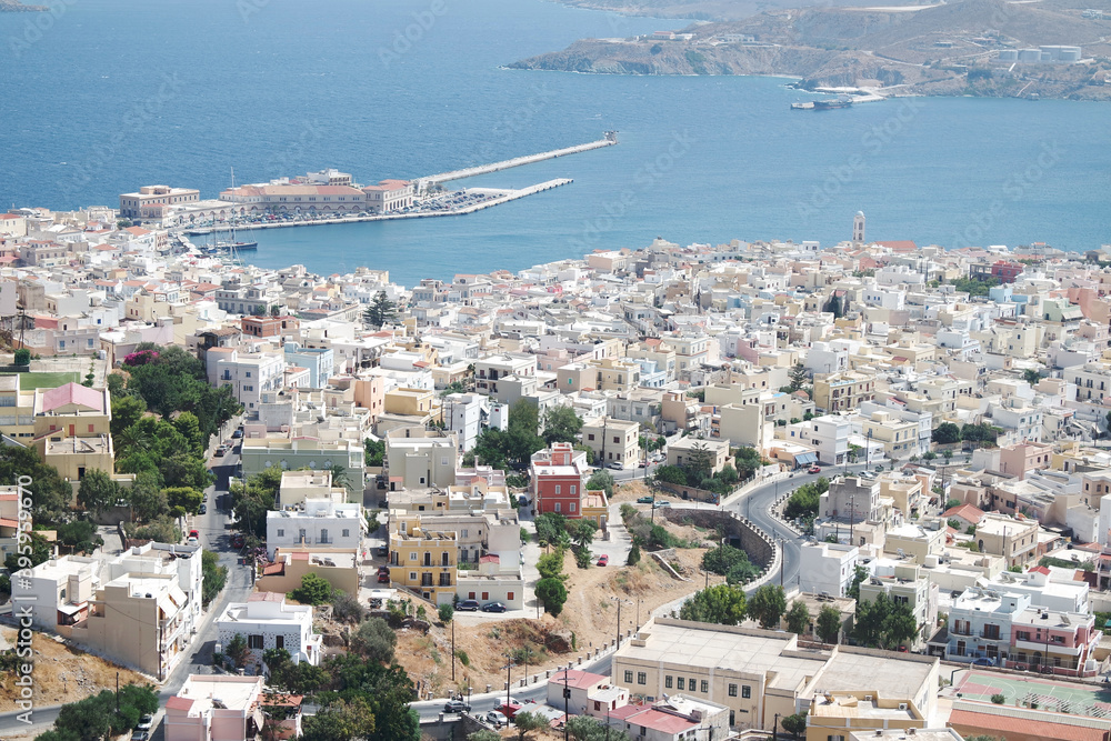 Ermoupoli port, Syros island, Greece. Capital of the Cyclades islands.  Beautiful, dramatic high level view from the imposing hills above the city.