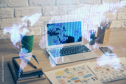 Multi exposure of business theme icons and work space with computer background. Concept of success.