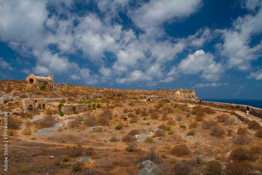 
dried stones exotic surface of the earth during the day and blue sky