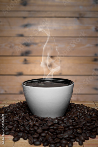 cup of black coffee on wood