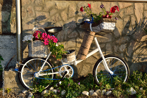 White Bicycle with flowers.