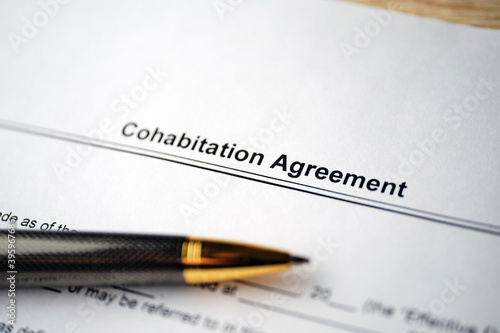 Legal document Cohabitation Agreement on paper with pen