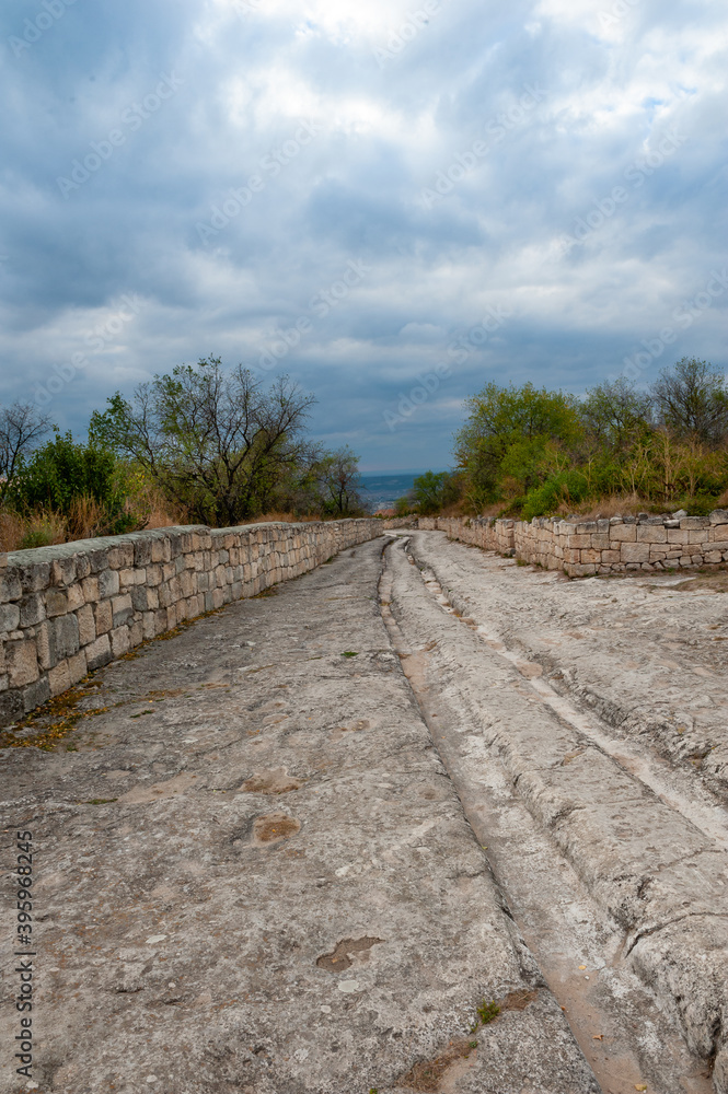 The ancient road through ancient ruins