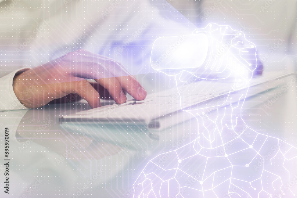 Fototapeta premium AR hologram with man working on computer on background. Augmented reality concept. Double exposure.