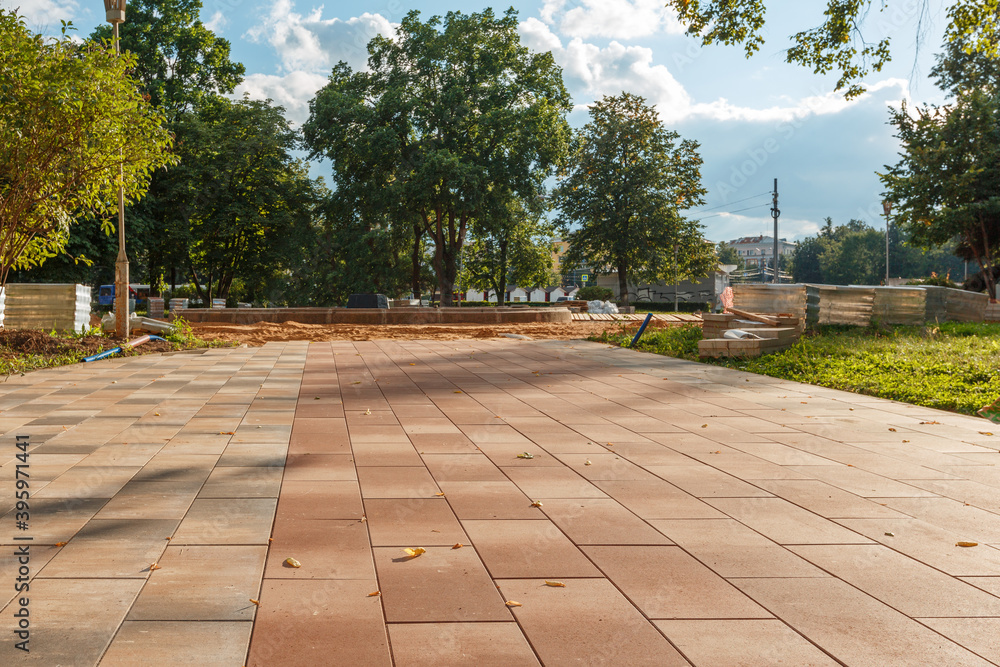 Laying a new pavement covering in the old park.