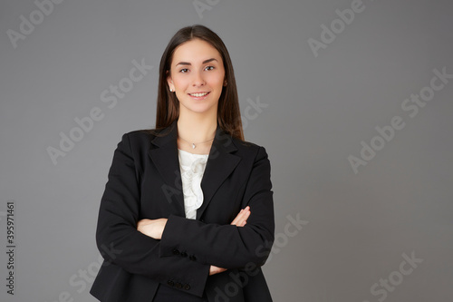 young businesswoman posing instudio background photo