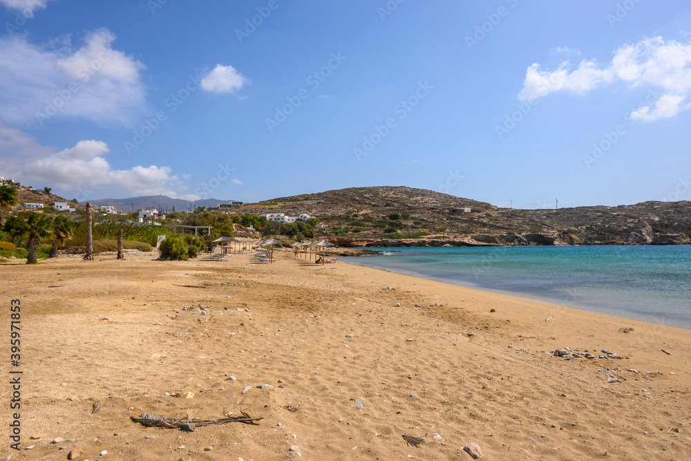 Koumpara beach with golden sand and white pebbles on Ios Island. Greece