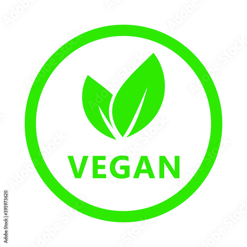 Vegan icon. Organic, bio, eco symbol. No meat, lactose free, healthy, fresh and nonviolent food. Round green logo with leaves for stickers, labels.