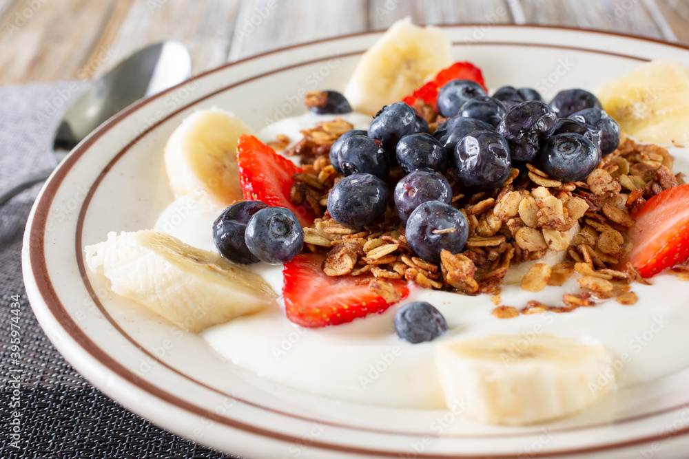 A view of a bowl of yogurt parfait. A view of a bowl of yogurt parfait.