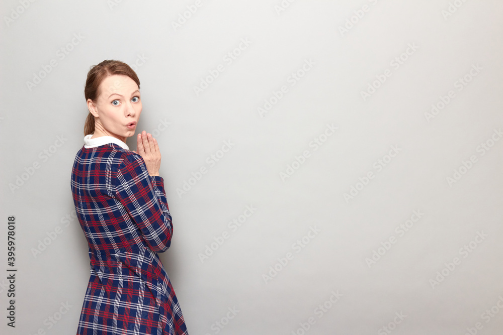 Portrait of surprised girl looking impressed and shocked by news Portrait of surprised girl looking impressed and shocked by news