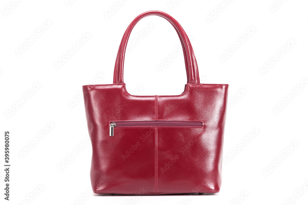 red stylish ladies leather bag on a white background, back view red stylish ladies leather bag on a white background, back view