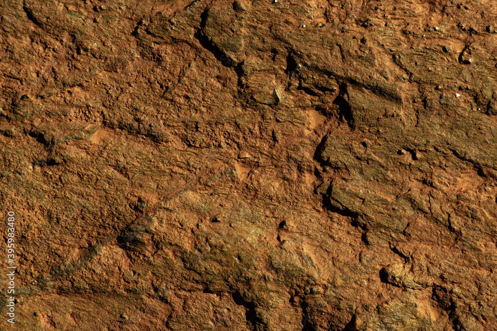 Brown wall abstract natural stone texture. Background for packaging and design. Stone wall pattern. Brown wall abstract natural stone texture. Background for packaging and design. Stone wall pattern.
