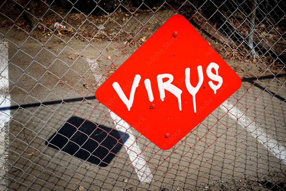 warning virus message painted on urban sign warning virus message painted on urban sign
