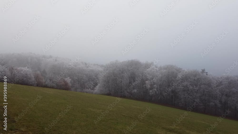 Aerial photos of a wooded winter landscape in Bavaria Aerial photos of a wooded winter landscape in Bavaria