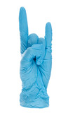 Blue medical disposable glove in the shape of a rocker goat symbol on a white background. Pandemic.