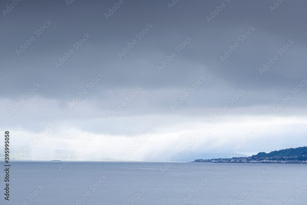 Dark grey sky storm weather in Gourock Inverclyde coast Scotland