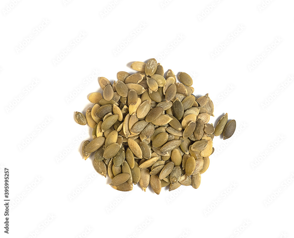 peeled raw pumpkin seeds on a white background peeled raw pumpkin seeds on a white background