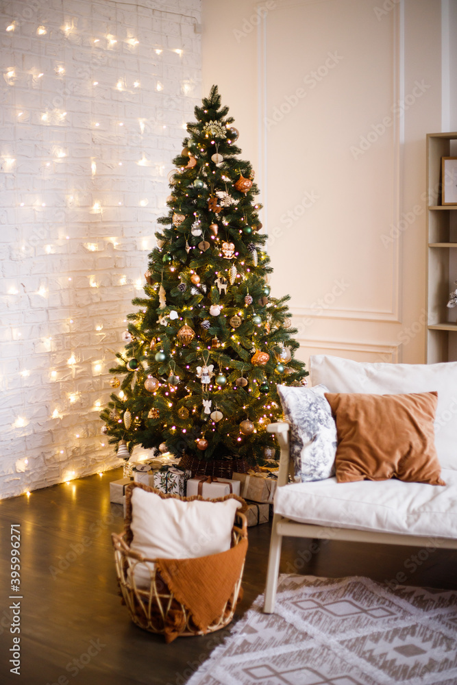 New Year's holiday or celebration, the mood, Stylish Christmas minimalistic interior, Presents and wrapped gifts under the Christmas tree. large white living room with a vintage sofa