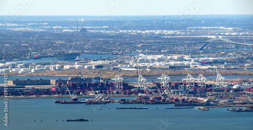 A view of Port Liberty and a full container ship in the New York Harbor in Bayonne New Jersey. photo