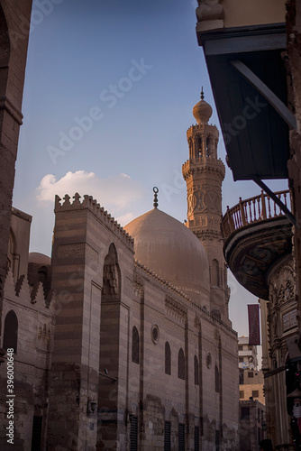 The minaret of a mosque in Muizz Street, Cairo photo