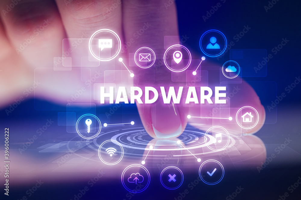 Finger touching tablet with web technology icons and HARDWARE inscription, web technology concept Finger touching tablet with web technology icons and HARDWARE inscription, web technology concept