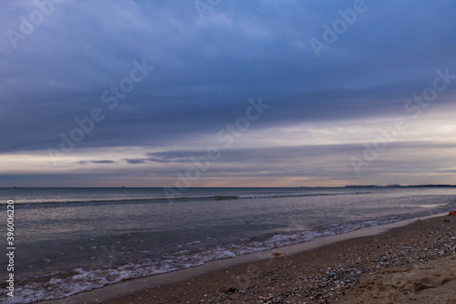  beautiful calm sea waving in the early morning on a golden sandy beach