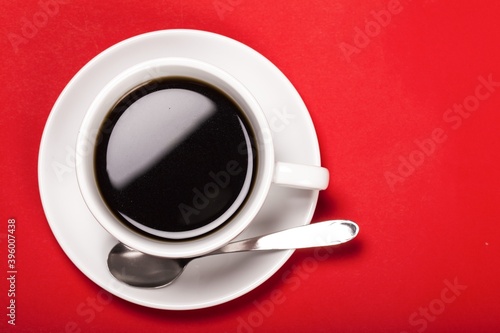 Cup of Coffee on Red Background