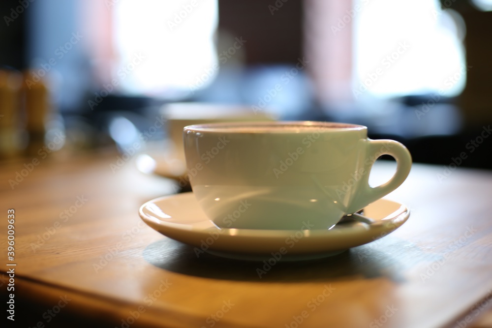 Fototapeta premium cup of coffee on the table