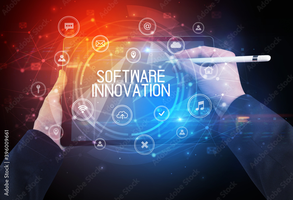 Obraz premium Close-up of a tablet with SOFTWARE INNOVATION inscription, innovative technology concept