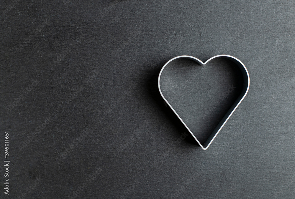heart-shaped cookie cutter on ardesia heart-shaped cookie cutter on ardesia