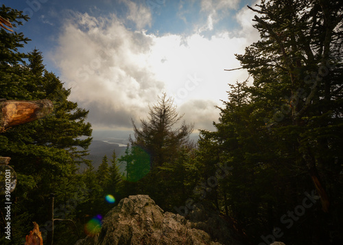 Sun behind White Clouds on Mountain Outlook
Haystack Wilmington VT 11.28.20