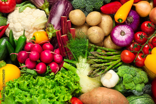 Different fresh vegetables as background  closeup view